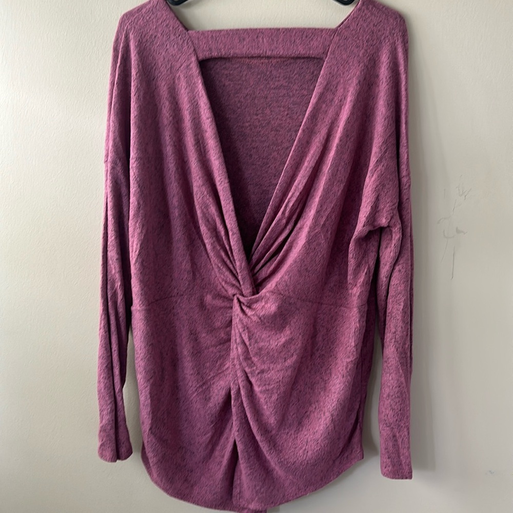 Like new tunic sweater crew neck but back has twist detail with split bottom